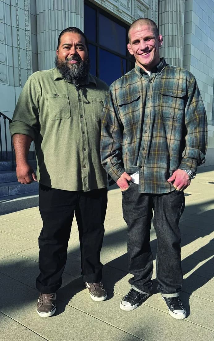 Bobby Taylor and coach Peter Cano standing outside Ventura City Hall